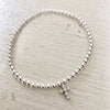 3mm Bead Stretch Bracelet with Sterling Silver/Cubic Zirconia Cross Charm