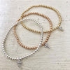 3mm Bead Stretch Bracelet with Sterling Silver/Cubic Zirconia Cross Charm