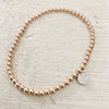 3mm Bead Stretch Bracelet with Silver/Cubic Zirconia Round Disc Charm