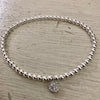 4mm Bead Stretch Bracelet with Silver/Cubic Zirconia Round Disc Charm