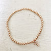 3mm Bead Stretch Bracelet with Matching Cubic Zirconia Cross Charm