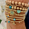 3mm Bead Stretch Bracelet with Matching Eye, CZ Bezel, and Turquoise Charms