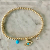 3mm Bead Stretch Bracelet with Matching Eye, CZ Bezel, and Turquoise Charms