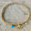 3mm Bead Stretch Bracelet with Matching Eye, CZ Bezel, and Turquoise Charms