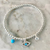 3mm Bead Stretch Bracelet with Matching Eye, CZ Bezel, and Turquoise Charms