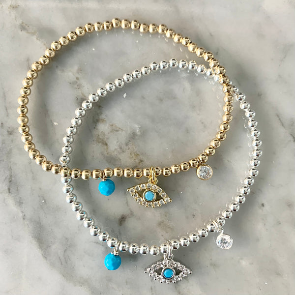 3mm Bead Stretch Bracelet with Matching Eye, CZ Bezel, and Turquoise Charms
