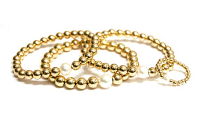 14kt Yellow Gold Filled Stackable Beaded Bracelet Adorned with One Fresh Water Pearl
