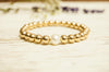 14kt Yellow Gold Filled Stackable Beaded Bracelet Adorned with One Fresh Water Pearl